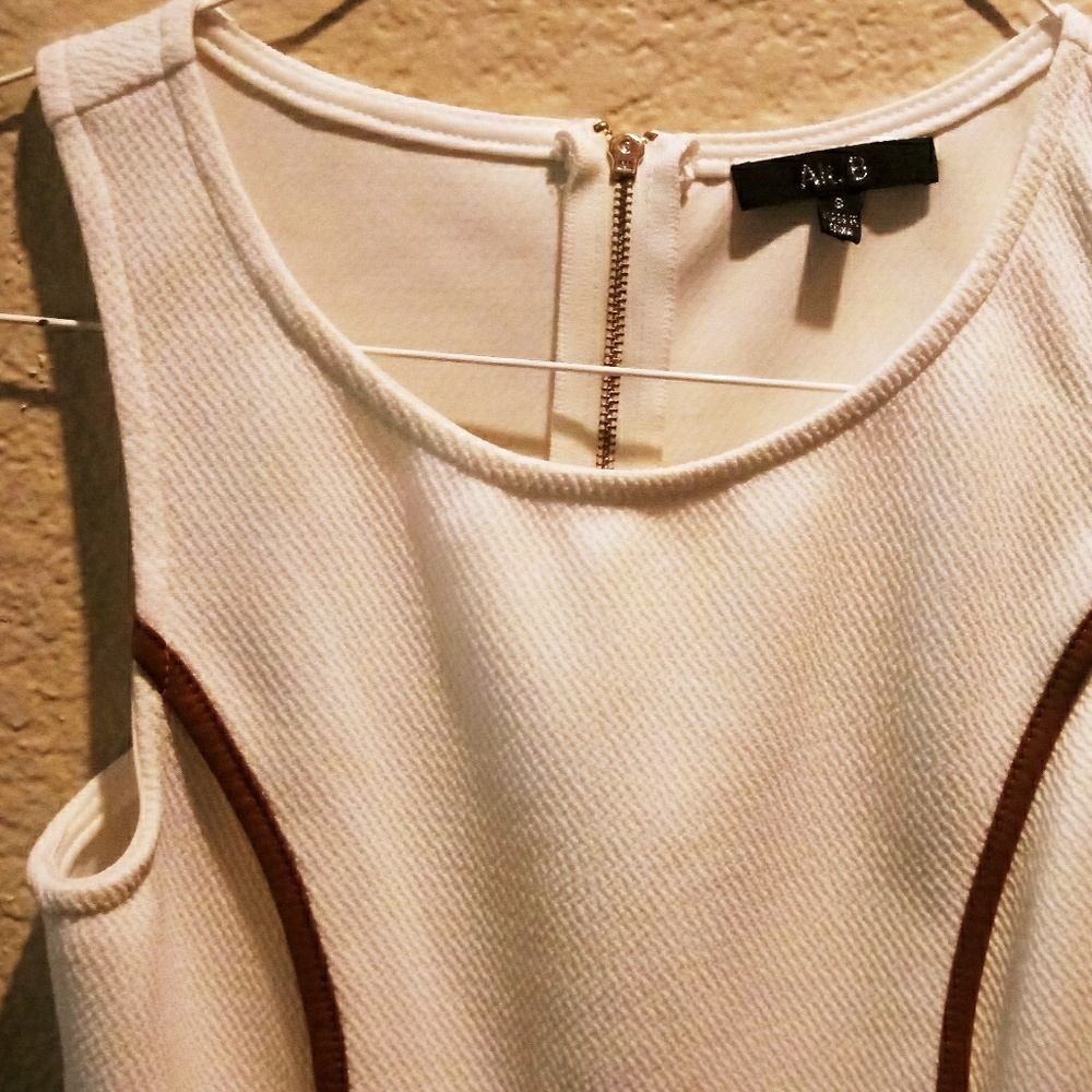 Adorable faux leather and spandex polyester blouse